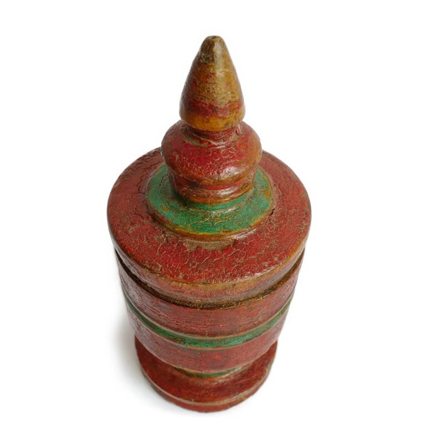 Antique Burmese lacquerware container hand-turned from wood and finished in richly layered cinnabar red lacquer with...