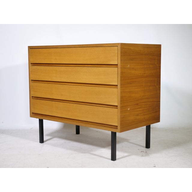 Mid-century walnut chest of drawers by Ernst Martin Dettinger for Bormann, 1960s. Rectangular body with four wide,...