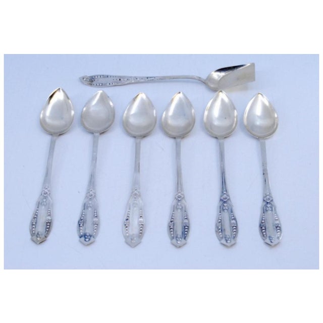 Silver Coffee Spoons and Sugar Shovel with Raised Handles, Set of 6, in Very Good conditions. Designed 1920 to 1949 This...