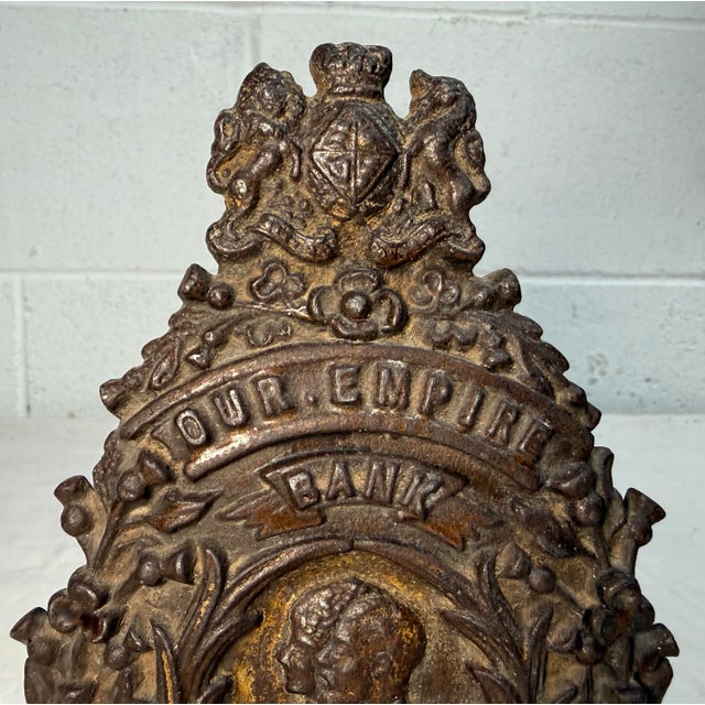 This rare antique King George V & Queen Mary "Our Empire" Coronation bank is a unique collectible item that pays homage to...
