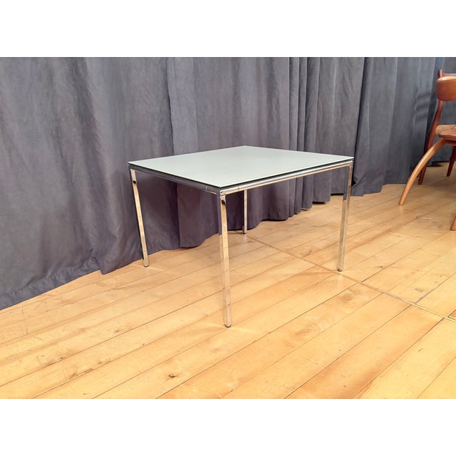 MDF Italia coffee table. In very good original condition. Excellent craftsmanship in polished steel and agglomerated...