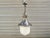 1930s industrial pendant light by kandem - körting & mathiesen leipzig. dark steel & enamel build with white opaline glass...