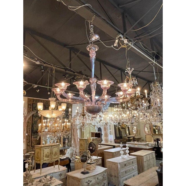 Stylish modern lavender Murano glass 10 arm chandelier. A truly impressive piece that provides a huge impact!...