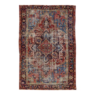 Antique Persian Heriz Handmade Medallion Motif Red and Blue Wool Rug For Sale