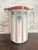 Art Deco faience pitcher made in Saint-Amand-les-Eaux, France. White ground with rust-orange pinstripes and teal-green...