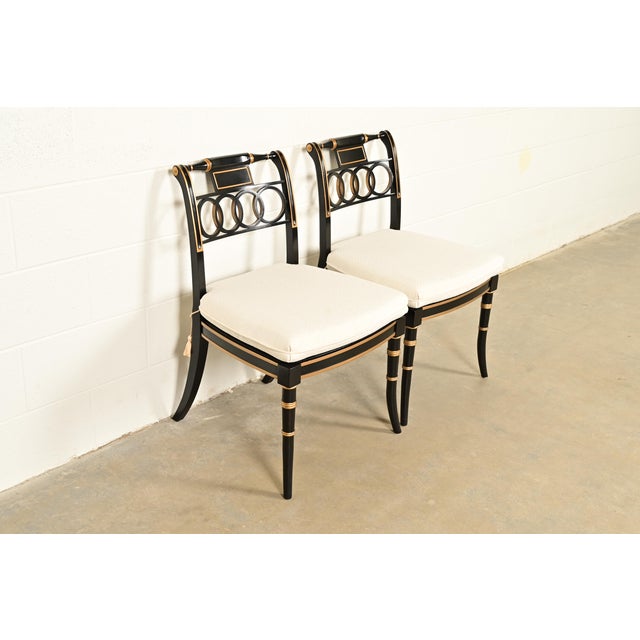 A gorgeous pair of Regency style side chairs or dining chairs By Baker Furniture, "Historic Charleston" Collection. USA,...