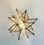 This hand-crafted Moravian star pendant illuminates your home with whimsical sparkle. Oxidized metal finish and clear...