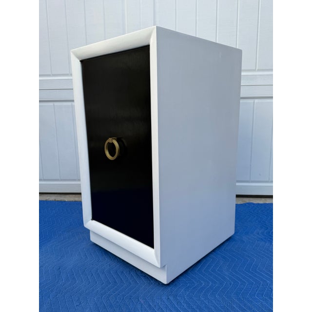 1950’s Two tone black and white cabinet designed by T.H.Robsjohn-Gibbings for Widdicomb.