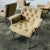 Armchairs made in Italy, with chromed steel structure, beige upholstery, and tufted buttons, 1980s. Measurements: seat...