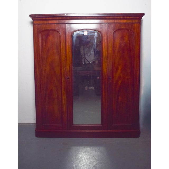 This elegant English wardrobe, crafted in the Romantic style, is a piece of excellent quality and thoughtful design. It...