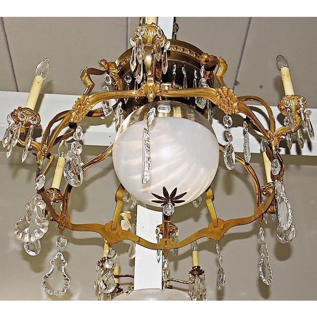Unique organic form of real Art Nouveau in this period French chandelier in 24k gilded lost-wax cast bronze with rococo...