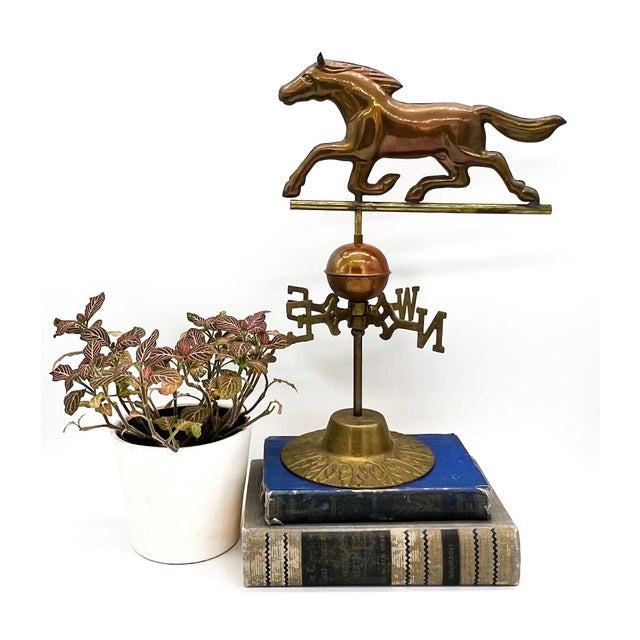 Stunning horse weathervane with brass base. Great for an equestrian lover or for rustic décor. Has lovely patina from age....