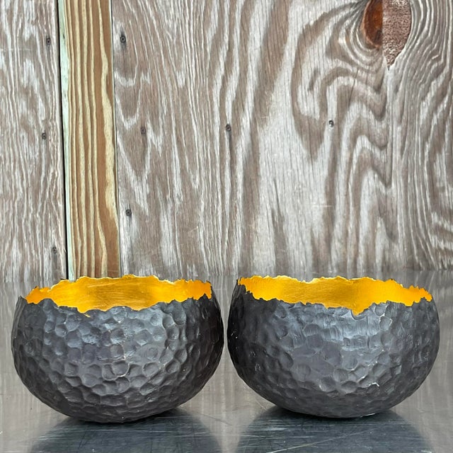 A spectacular pair of vintage contemporary Alexander Lamont bowls. Beautiful hand hammered brown eyes lined with glowing...