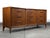 Exceptional mid century modern walnut lowboy dresser by Widdicomb, dating to the 1960s. This beautifully crafted piece...