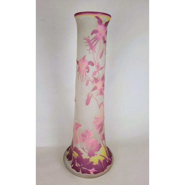 Large multilayer glass vase, with a decor cleared with acid, from cyclamens in flowers and buttons Japanese Gallé...