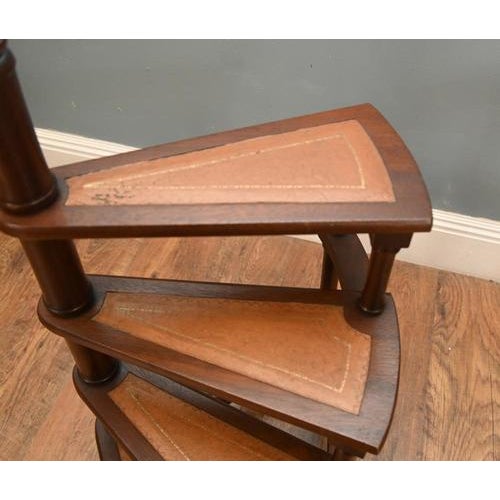Elegant set of Regency style mahogany spiral library steps designed to provide access to high bookshelves The steps wind...