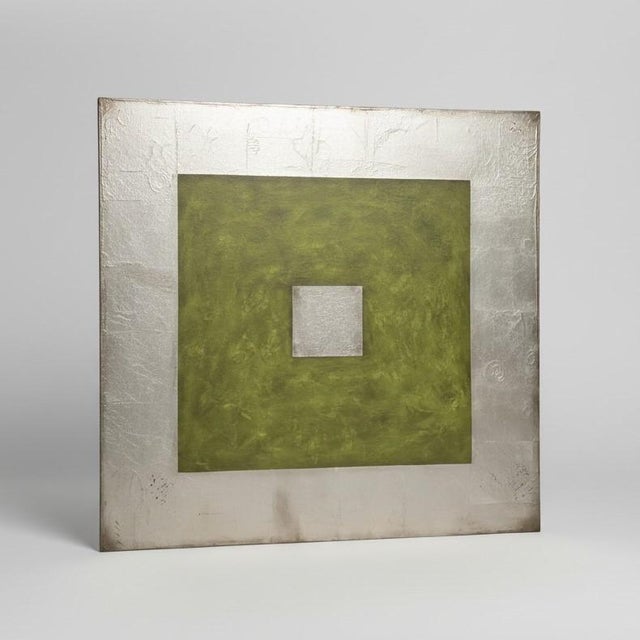 This striking abstract canvas features a rich, mottled green field that evokes natural landscapes or aged patinas. At its...