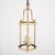Pair of lanterns from France made with a solid brass structure and curved glass panels. There are two arms with candelabra...