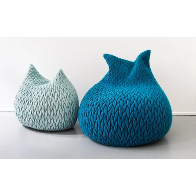 The pouffes are made in a three-dimensional elastic fabric and their shapes are highly flexible. They take the form of...