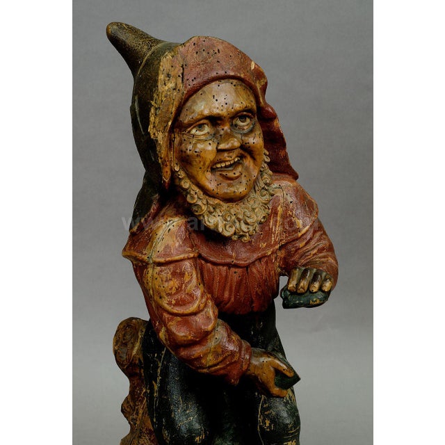 Whimsical Carving of a Dwarf with Snuffbox 19th century A 19th century funny carved and painted dwarf with snuffbox....