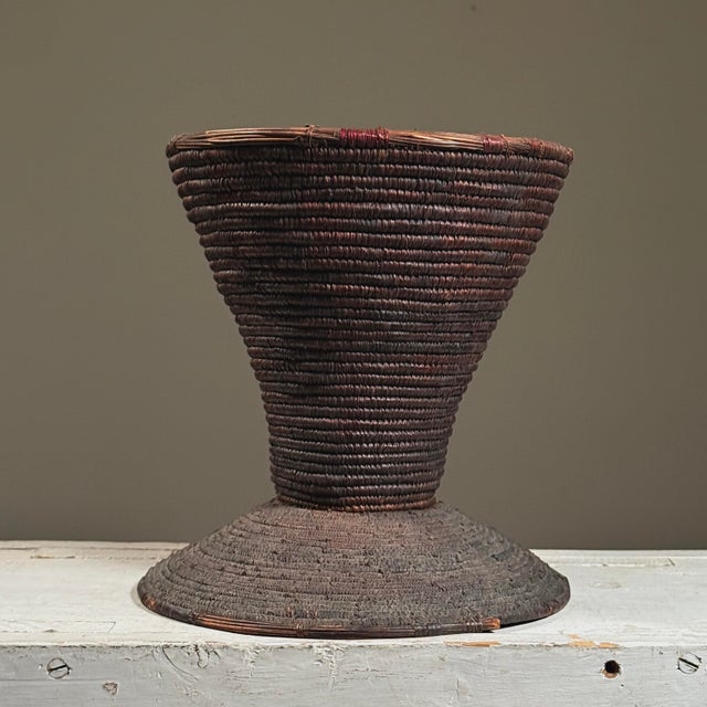 Antique Filipino Ifugao Hand Woven Reed Basket/Vessel. Dark patina woven natural fiber vessel in an hourglass shape. In...