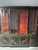 Make a statement with this stunning black lacquered chinoiserie breakfront china cabinet. Featuring intricate hand-painted...
