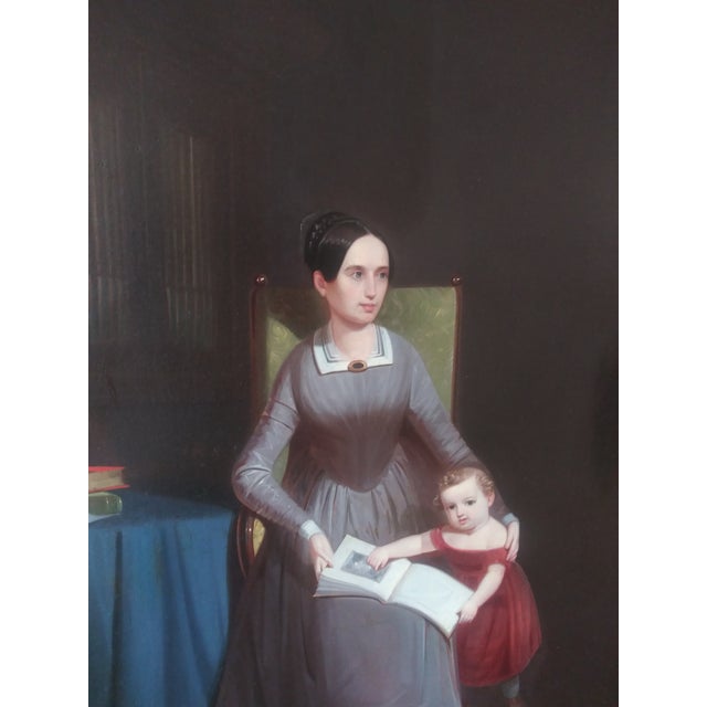 This wonderful portrait of a young immigrant mother and her child was painted by a traveling artist. To make his work...