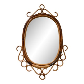 1970s Bamboo and Rattan Decorative Scroll Oval Mirror For Sale