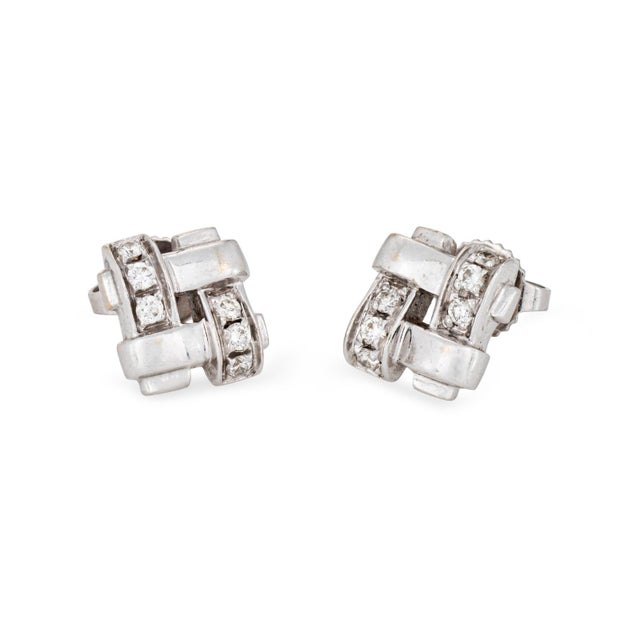 Chic and stylish pair of vintage Tiffany & Co diamond Vannerie stud earrings crafted in 18k white gold (circa 2002)....