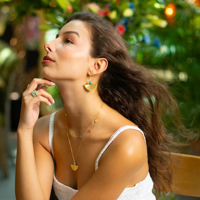 Step into the mystique of ancient Egypt with these Cleopatra Sunburst Turquoise Gold Earrings. Handcrafted in sterling...