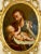 This painting is from Northern Spain of a religious reverse painting on glass depicting Saint Joseph with the Christ...