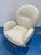 Stylish HTL Corian Italian Leather High Back Swivel Chair. Cream leather, curved body. Showroom floor sample.
