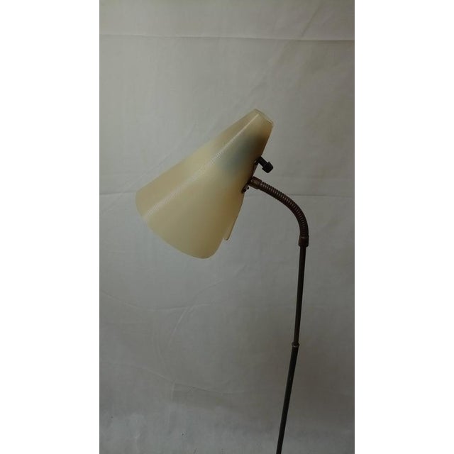 Rare swedish midcentury floorlamp with an acryl shade and metal basement in used condition. The lamp has small signs of...