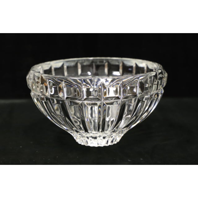 A Late 20th Century decorative crystal bowl. Clear crystal round bowl with a square cut diamond pattern at rim with square...