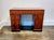 Lovely little Art Deco desk, mahogany wood with brass and Bakelite pulls and black decorative trim. In good condition with...