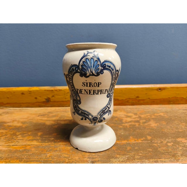 This apothecary jar, made of terracotta, was used to store various dry substances in the 18th century or early 19th...