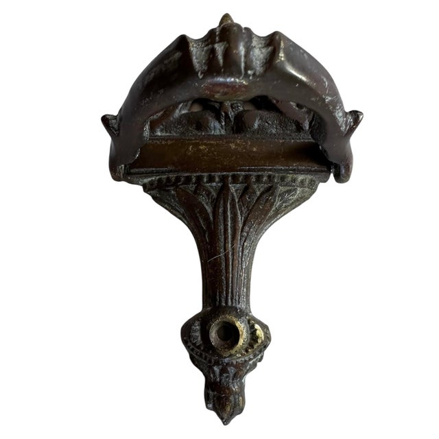 This knocker is just a great cast brass piece with sphinxes adorning the sides and perfect for a small charming door.