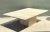 Showcasing refined Italian minimalism, this vintage mid-century coffee table is sculpted entirely from natural beige...