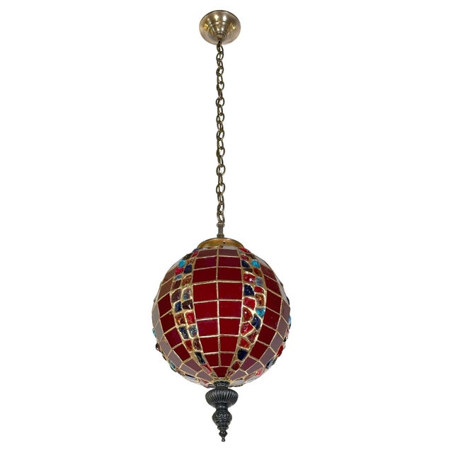 Turkish style pendant fixture featuring red stained slag glass panels accented with multi colored mosaic glass chunks and...