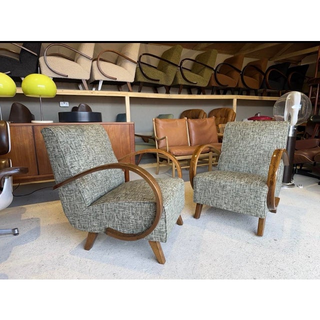 Jindrich Halabala armchairs. Brand new upholstery, new cushion seats, new covers all over. The springs are original in...