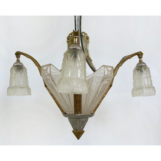 Art Deco Gilt, Silvered Bronze Chandelier, Frosted Glass Shades Offered for sale is an Art Deco gilt and silvered bronze...