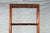 Brown Chinese Early 20th Century Wooden Bookcase with Woven Rattan Shelves and Apron For Sale - Image 8 of 13