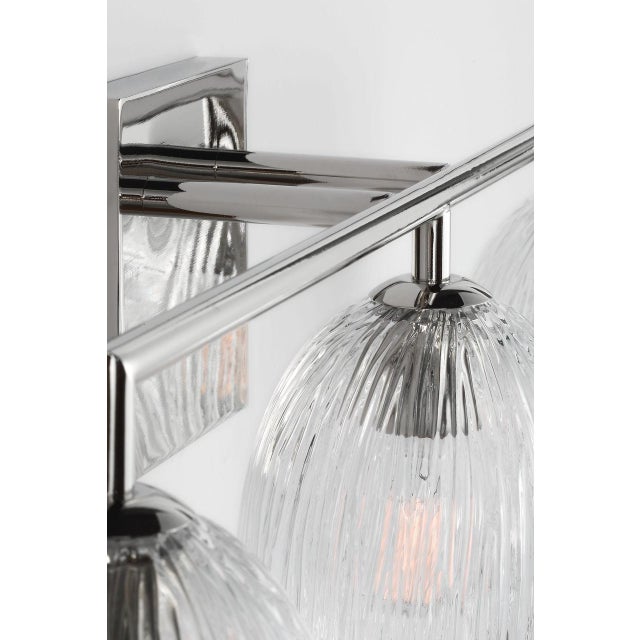 Serafina 27-inch Vanity by Hable extends the collection's organic elegance with a wider composition of sculptural glass...