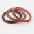 These charming Lucite bracelet bangles have a domed shape and are made of transparent Lucite in a pink hue, injected with...
