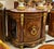 Introduce timeless grandeur into your home with this magnificent French Louis XVI display commode cabinet, masterfully...