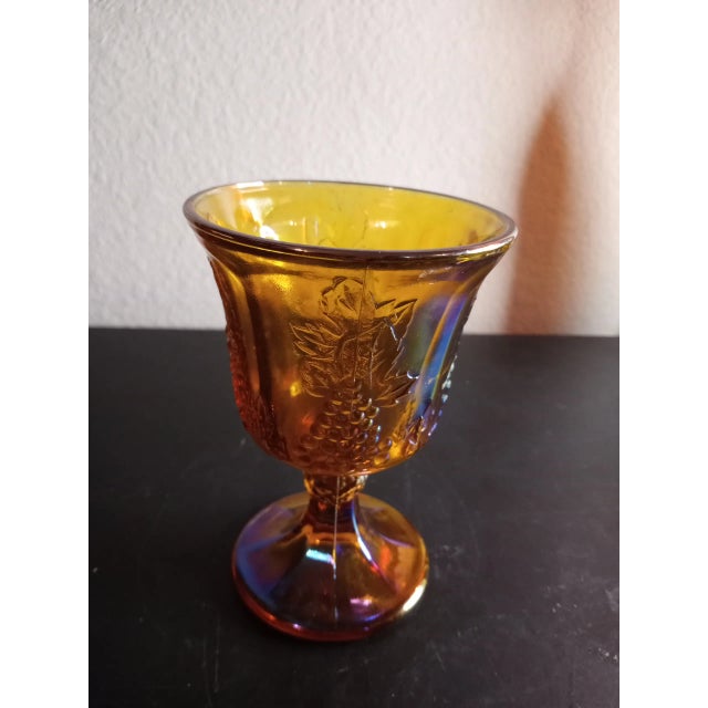 This is a vintage Indiana Glass Marigold HARVEST Carnival Glass Goblet Single. Procured at auction