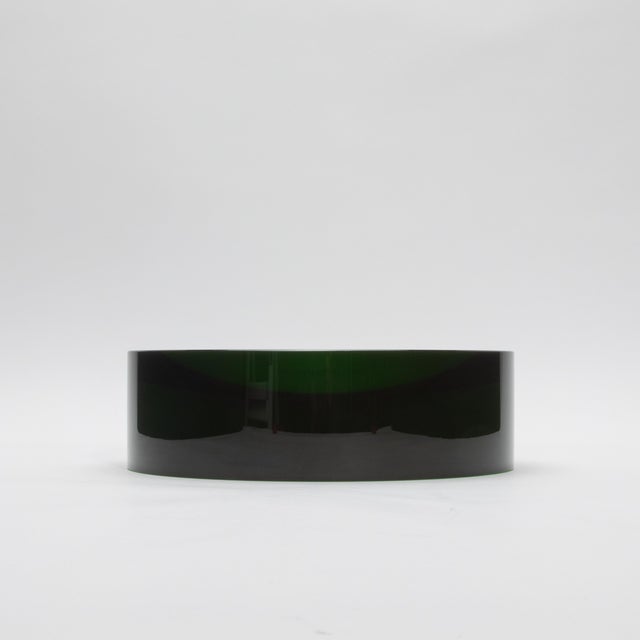 The Green Crystal Convex Bowl in green by KA Glass is a stunning 10-inch masterpiece that exemplifies the art of hand-...