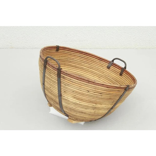 Large basket made of wicker and sheet iron, made in Germany in the 1940s/1950s. Very good condition; slight traces of the...