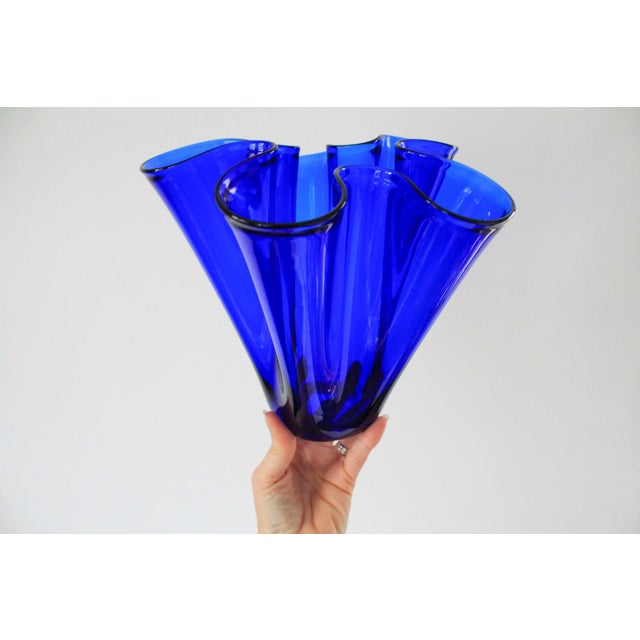 Vintage hand blown handkerchief ruffled Cobalt blue vase. No makers mark. Some age wear/chips to bottom edge. Pictured.