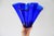 Vintage hand blown handkerchief ruffled Cobalt blue vase. No makers mark. Some age wear/chips to bottom edge. Pictured.